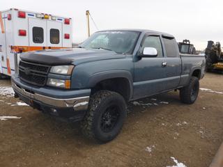 2006 Chevrolet Silverado LT 4X4 Extended Cab c/w 4.8L Vortec, Showing 151,018 Kms, 4,854 Hours, A/C, GVWR 6,400 LB, 35X12.5R17 Tires At 70%, Front Axle Rating 3,925 LB, Rear Axle Rating 3,750 LB, Lifted, Tri Fold Soft Tonneau Cover, VIN 1GCEK19V56Z111197 *Note: Check Engine Light On, Service Air Bag Light On, Service 4X4 Light On*