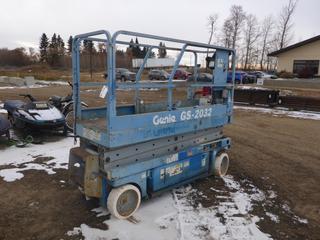 Genie GS-2032 Scissor Lift c/w Manual Lowering Valve, Charger and Key *Note: Running Condition Unknown*