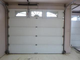 10ft X 8ft 5-Panel 3-Light Garage Door C/w 1/2HP Steel-Craft Garage Opener And Track **Note: Cannot Be Removed Before Nov. 10th, Buyer Responsible For Load Out, Located Offsite For More Info Contact Shazeeda @780-721-4178**
