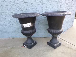 Qty Of (2) Resin Urn Flower Pots **Note: Buyer Responsible For Load Out, Located Offsite For More Info Contact Shazeeda @780-721-4178**