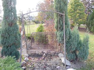 Metal Garden Swing **Note: Buyer Responsible For Load Out, Located Offsite For More Info Contact Shazeeda @780-721-4178**