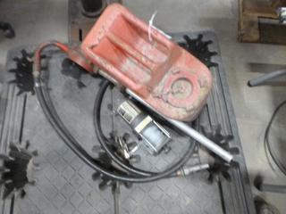 (1) Gas Can, (1) Hand Pump W/ Hose, Model V100, (1) Winch Champion 2000 Lbs.