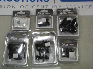 Qty of Assorted Spy Point XCEL Camera Items: (1)  Anti-Fog Inserts, Model XHD-FOG, (1) Tripod Mount, Model XHD-TPM, (1) Sling Stud Mount, Model XHD-SSM, (1) Vented Helmet Mount, Model XHD-VHM, (1) Suction Mount, Model XHD-SM, and (1) Decoy Mount Model XHD-DM (Upstairs)