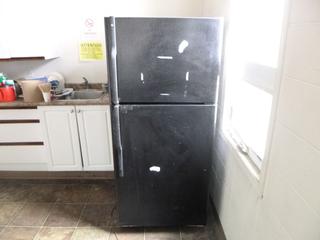 66 1/8in X 2 1/2in X 30 1/4in General Electric Model GTH18KBR0RBB 110-120V Refrigerator. SN VH510419
