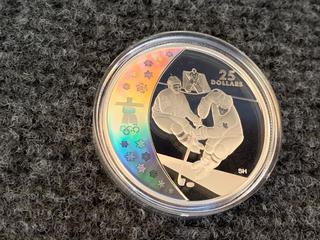 2007 Canada Twenty Five Dollar Silver "Vancouver 2010 Olympic Winter Games - Ice Hockey" Holographic Coin c/w Display Case.