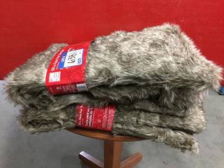 (2) Brown 60" Faux Fur Tree Skirts.