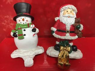 (1) Santa & (1) Snowman Stocking Holder.
