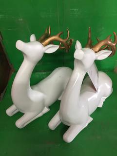 (2) 12" Sitting Deer With Antlers.