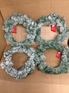 (4) 26" Flocked Wreaths.