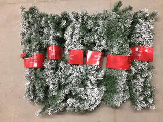 (6) 9' Flocked Garland.