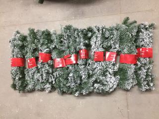 (10) 9' Flocked Garland.