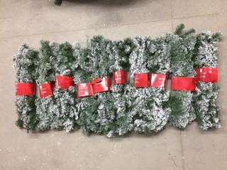(10) 9' Flocked Garland.