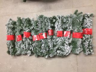 (10) 9' Flocked Garland.