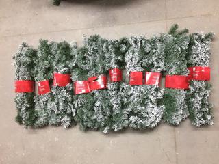 (10) 9' Flocked Garland.