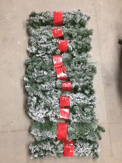 (10) 9' Flocked Garland.