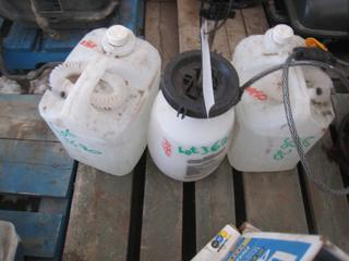 Round Up Hand Pump Sprayer, (2) Jugs of Diesel Exhaust Fluid.