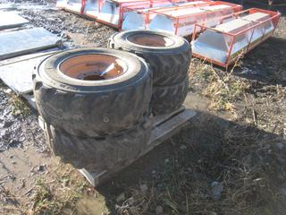 (4) Skid Steer Rims & Tires. Approximately 12x16.5.