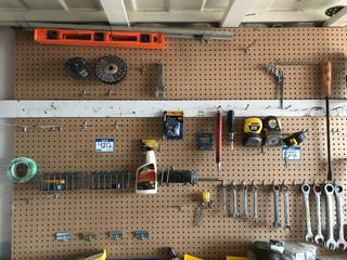 Contents of Tool Board (Peg Board Included. Quantity of Screw Drivers, Tape Measures, Wire Brushes, Levels, etc.