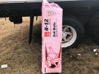 Bag of R-12 2x4 Fiberglass Insulation.
