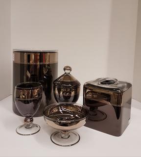 Sable Brown & Pewter Accent Italian Glass Vanity Set (5 Piece) Waste (7"R x 9.5"H); Tissue (5"W x 5"L x 6"H); Lidded Container (7.5"H) Cup (5"H); Pedestal Soap Dish (5"R x 3"H)