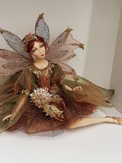"Katherine's" Spice Fairy (Sitting) (16"H).  No portion of the proceeds for this lot will be donated to Alberta Ballet.