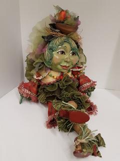 "Katherine's" Collectible Lettuce Lady (7.5"W x 33"H).  No portion of the proceeds for this lot will be donated to Alberta Ballet.