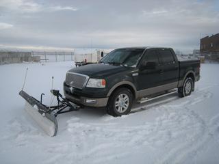 2004 Ford F150 Lariat Extended Cab P/U, Triton 5.4, Auto, Showing 323,864 Kms c/w Glacier Winch-operated Front Plow (controlled from Truck Cab). Color Match solid Tonneau, Pickup GVWR 7200LBS (3265KG) S/N 1FTPW14554KD44412.*NOTE - Passenger side window will only operate from Passenger door switch