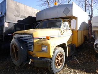 1984 Ford Service Truck C/w V8 Diesel, 5-Spd Manual Transmission, Assorted Hoses And (2) Tires. Showing 140,525kms. VIN 1FDMF60H7EVA16436 