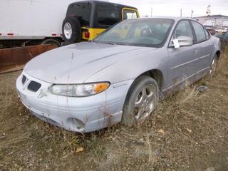 1998 Pontiac GTP Supercharged Grand Prix C/w 3800-V6, A/T. Showing 232,303kms. VIN 1G2WP5213WF288955 *Note: Needs Exhaust Work And Windshield Cracked*