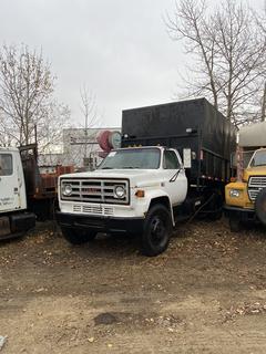 1984 GMC Sierra 5000 Tree Trimming Chip Truck Box And Hoist C/w V8 Gas, A/T, 12ft Tilt Deck, Live Roll And Winch. Showing 129,117Kms. VIN 1GDE5D1A1EV515813 *Note: Runs*