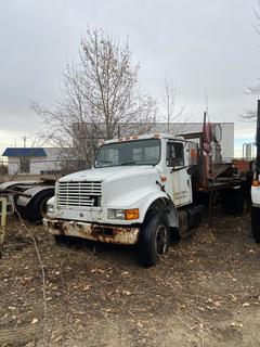 1990 International Model 4700 S/A Tilt Deck Truck C/w Navistar DT466 Model B180F Diesel Engine, PTO, 16ft Steel Deck, Spicer Double Duty D w/ 2-Speed Axle Transmission And S/A Rear End. Showing 154,235Kms. VIN 1HTSCCFP2LH658384 *Note: Running, Contents On Rear Deck Not Included 