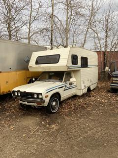 1979 Datsun Trav-L-Mate Chief Motorhome C/w Inline 4 Gas Engine, 4-Speed Manual, 4600lb GVWR, 1760lb Front And 2880lb Rear. Showing 83,722Kms. VIN 792823 *Note: Roof Vent Cover Missing, Roof Caving In, Starter Issue, Running Condition Unknown*