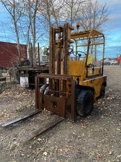 Komatsu FG35-1 8000lb Cap. Rough Terrain Forklift C/w 6-Cyl, Manual, 2-Stage Mast And 48in Forks. Showing 6129hrs. SN 60109 *Note: Turns Over, Needs Fuel Pump*