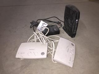 Motorola Modem, Radioshack Intercom & Backup Power Supply.