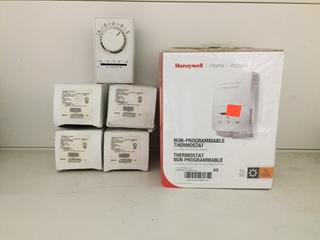 (3) Honeywell Thermostats & (4) Heat/Cool Thermostats.