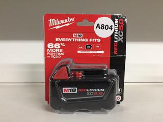 Unused Milwaukee M18 XC5.0 Red Lithium Battery.