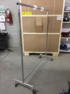 Rolling Clothing Rack, 67"H x 59"W.