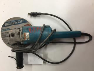 Makita 9005B 5" Angle Grinder With Grinding Wheels.