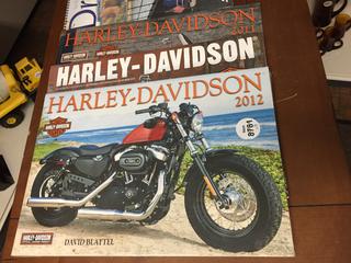 (4) Harley Davidson Calendars.