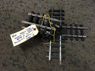 1 Track Crossing And 4 Pieces Of 6 In. G Scale Track.