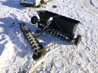 Red Rock Tow Behind Spreader/Aerator *Note: Back Wheels Broken and Bent, Handles Are Bent, All Blades Except 1 In Good Condition*