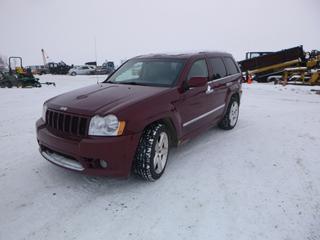 2007 Jeep Grand Cherokee SRT8 c/w 6.1L Hemi, A/T, AWD, A/C, Fully Loaded, Leather, Power Sunroof, Heated Seats, Showing 166,899 Kms, 255/45R20 Tires c/w (4) Tires and (2) Spacers (In Warehouse O-1-1), VIN 1J8HR78307C691712 *Note: Tire Pressure Light On*