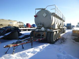 2014 Heil Quad Axle Tank Trailer C/W 8500 Gallon TC407 Tank, Finch II Meter, VIN 5HTDL3644E5G27023 *NOTE Will Be Sold With Active CVIP(As Per Owner) Asset Located @ 21122 TWP RD 582, Redwater AB Call Connor Tighe 780-218-4493 for Viewing/Load Out*