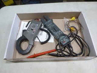 (1) OTC Current Clamp DCA and ACA, and (1) Reed ST-2001 Electrical Tester (E2)