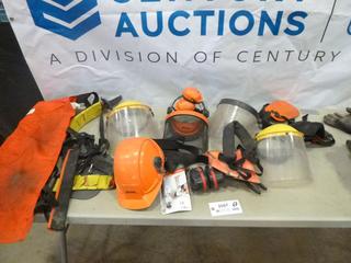 Assortment of Safety Gear, Hard Hats, Face Shields, Ear Muffs, Chain Saw Pants and Shoulder Straps, (P-1-1)