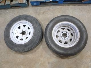 (2) Tires on Rims, (1) Good Ride ST205/75R15 (c/w Plug), (1) Carlisle ST205/75R15 (Row 2)
