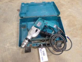Makita 1/2 In. to 3.4 In. Hammer Drill, Model HP2010N with Case  (L-2-3)