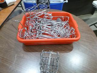 Assortment of Restaurant/Kitchen Supplies: Jam Package Holders, Condiment Bottle Holders, Menu Holders, Wall Hangers, Clothes Hangers, Plastic Bowls-Various Sizes, Cleaning Supplies, etc. *Note: Plastic Tubs Included But Metal Crate Not Included* (P-5-3)