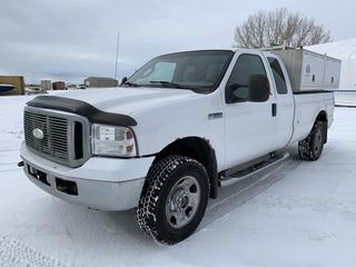 2006 Ford F350 XLT Super Duty 4x4 Service Truck c/w 5.4L V8, Auto, A/C, Slide In Service Body w/ Side Storage, Rolling Floor and Roof Rack, 285/65R18 Tires, Showing 350499 Kms. VIN 1FTWX31566EC84263.