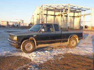 1988 Chevrolet S10 4X4 Extended Cab Pick Up c/w V6 2.8L, A/C, Showing 37,927 Kms, 235/75R15 Tires At 50%, 6 Ft. Box, VIN 1GCDT19R1J2209432 *Note: Needs Boost, Missing Driver Side Mirror, Inside Mirror Missing*